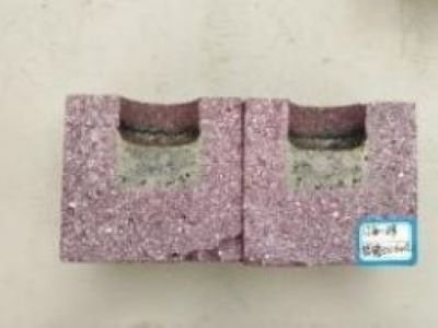 Figure 2 Cross-section of the static crucible corrosion resistance test of aluminum-chromium D brick